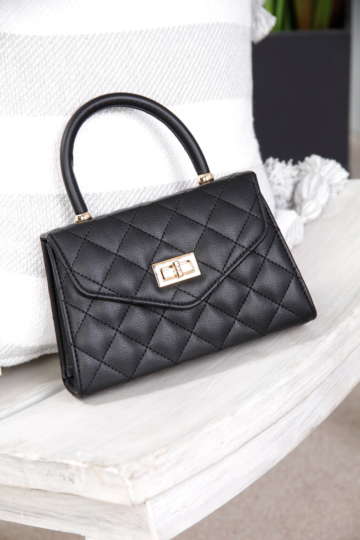 Black padded outlet handbag